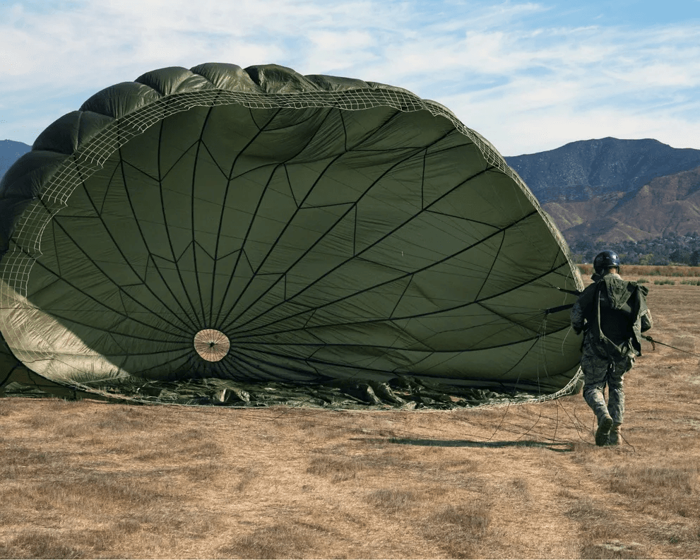 Military operator under canopy